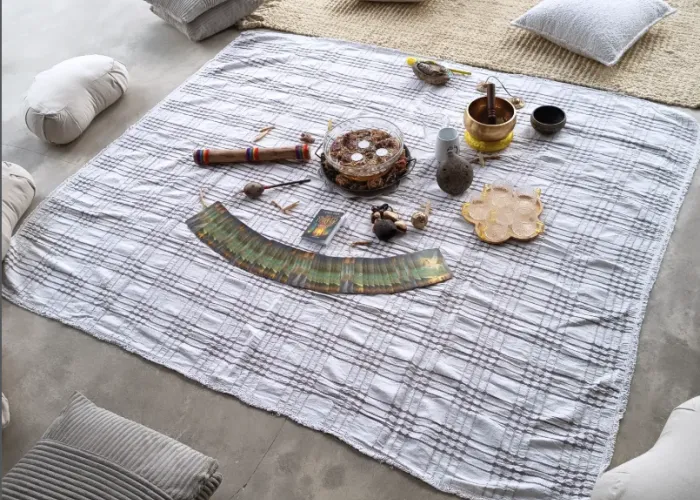Yoga setup with pillows and blanket